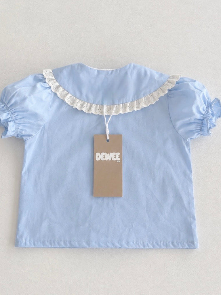 Puffy sleeved light blue shirt