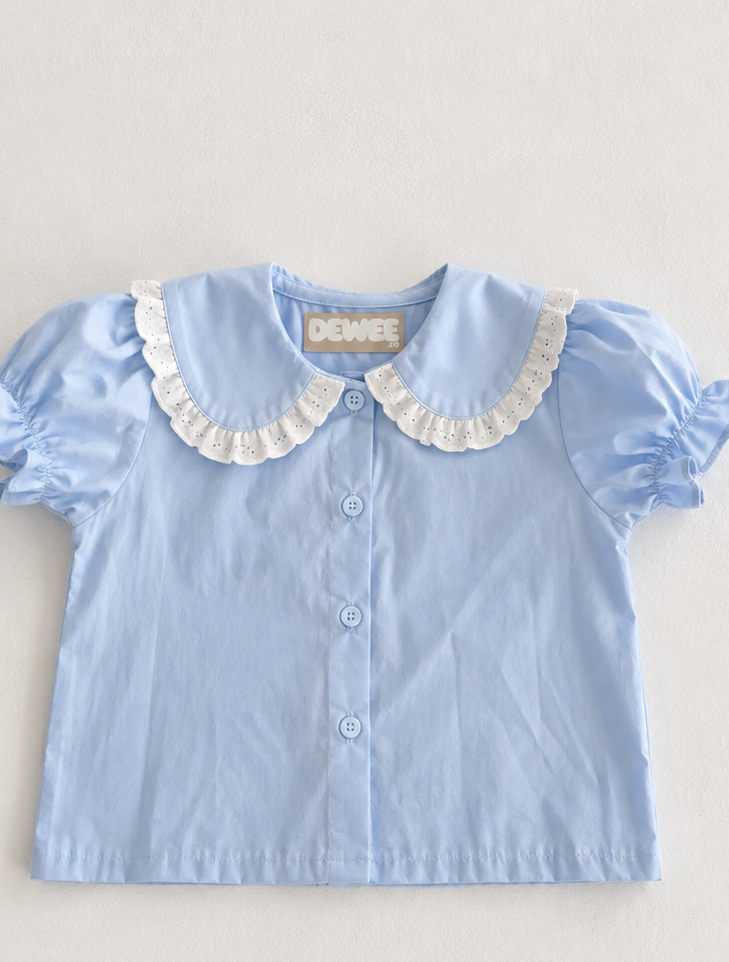 Puffy sleeved light blue shirt